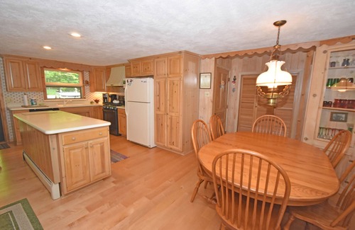 Empire Cottage | Lakefront home on Little Glen Lake with fireplace, deck, gas grill, and firepit