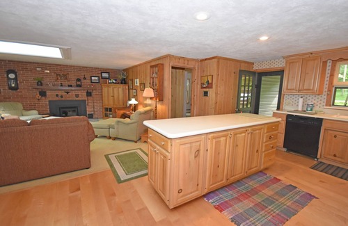Empire Cottage | Lakefront home on Little Glen Lake with fireplace, deck, gas grill, and firepit
