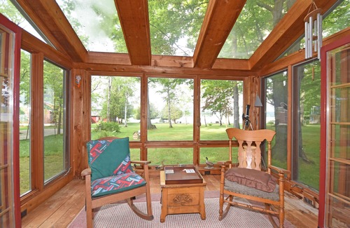 Empire Cottage | Lakefront home on Little Glen Lake with fireplace, deck, gas grill, and firepit