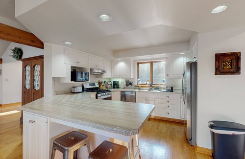 Hazelhurst House | Lakefront home with private outdoor sauna, dock, firepit, wood fireplace & patio