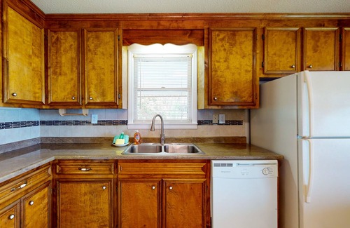 Prosperity House | Lakefront home with incredible sunset view, private dock, screened porch, and AC