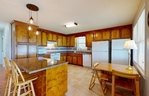 Prosperity House | Lakefront home with incredible sunset view, private dock, screened porch, and AC