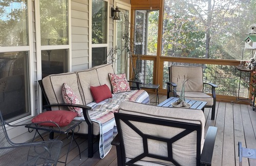 Winchester House | Lakefront home with dock. Cozy 2 bed 2 bath and screened in porch.