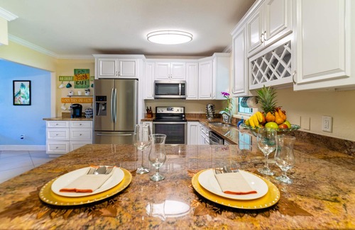 Lake Worth House | Lakefront Oasis for Gatherings - Heated Pool Tiki Huts Game Room Sleep 14