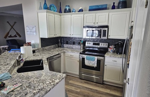 Lake Ozark Condo | Lakeside ground level condo with beautiful lake views!