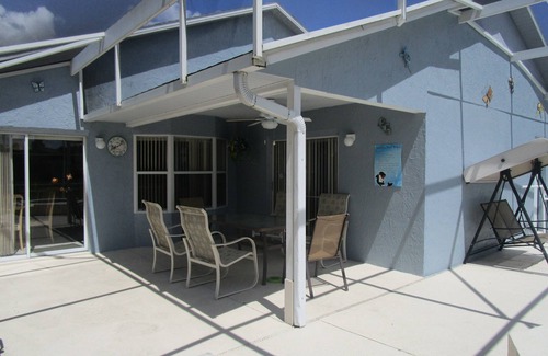 Windward Cay Villa | 'Lakeside Haven' Fantastic South Facing Pool, Spa and Stunning Lakeside Views.