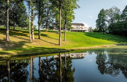 Lansing House | Lansing Orchard · Sleeps 29, 8300 sq ft house, 6 acres, stocked pond