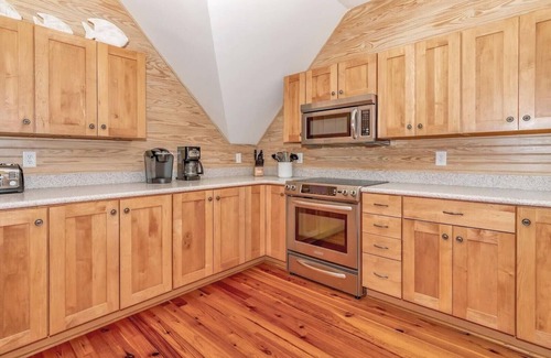 Cape Fear Station House | Large deck on main level and screened in porch, private crofter; access to both clubs!
