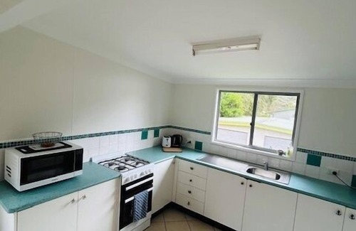 Hat Head House | Large holiday home opposite the creek with plenty of room for all the family