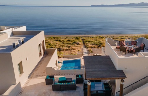 Nopolo Villa | Large Luxury Beachfront Villa with Pool, Paddleboards, Golf Carts- Family Ready!
