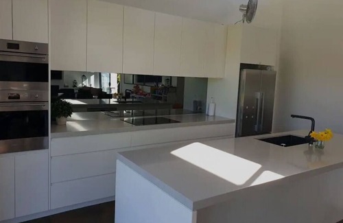 Willoughby House | Large, modern, resort-style house with pool, lawns, 4 bedrooms & 2.5 bathroomsn