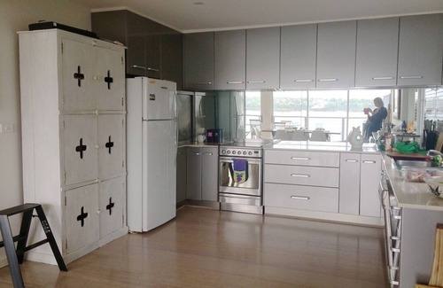 Bundeena House | Large north facing waterfront with huge deck, 4 bedrooms & 4 bathrooms. Pets ok.