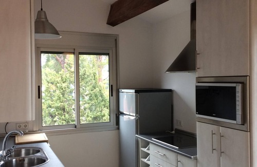 El Catllar Apartment | Large private pool, entire new build cool airy flat, gardens, parking, WiFi