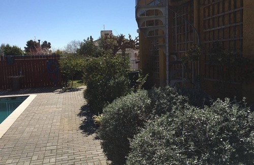 El Catllar Apartment | Large private pool, entire new build cool airy flat, gardens, parking, WiFi