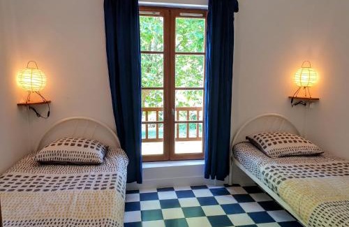 Port-Sainte-Marie House | Le Nid - Maison dans les bois avec cheminée et vue