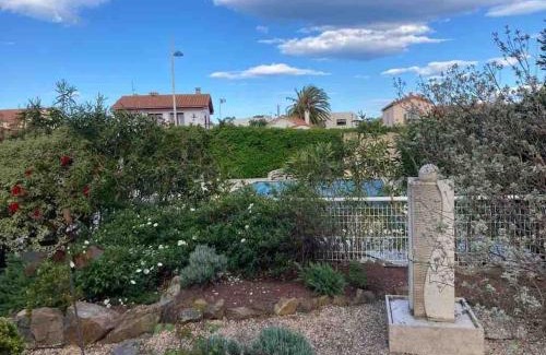 Les Arenes Apartment | Le Papounet Appartement - Maison de 150m2 à 500m de la plage et du centre ville