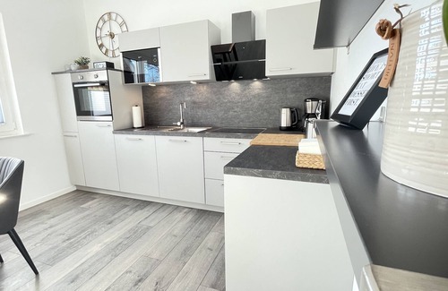 Wremen Apartment | Lee-Modern newly built apartment near the beach *Wallbox*