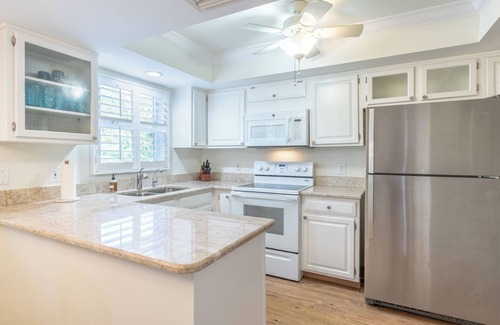 Moorings Condo | Less than 2 miles to the beach! West of 41 condo with pool and hot tub!