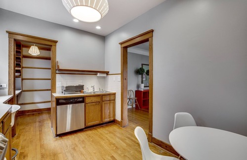 North Center Apartment | Light Filled with Tasteful Pops of Color - You Will Love This Mid-Century Modern Gem by AllSet Turnover