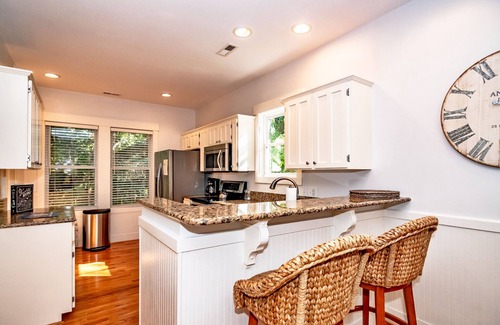 Bald Head Island Cottage | Live oak views from this 3 bedroom cottage; 2 golf carts and peaceful screened in porch