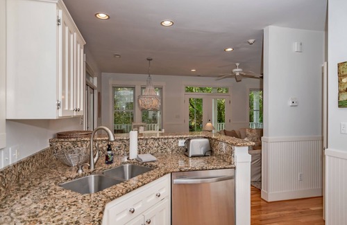Bald Head Island Cottage | Live oak views from this 3 bedroom cottage; 2 golf carts and peaceful screened in porch
