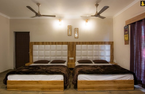 Bullawala Resort | LivingStone River side Hills resort family Room