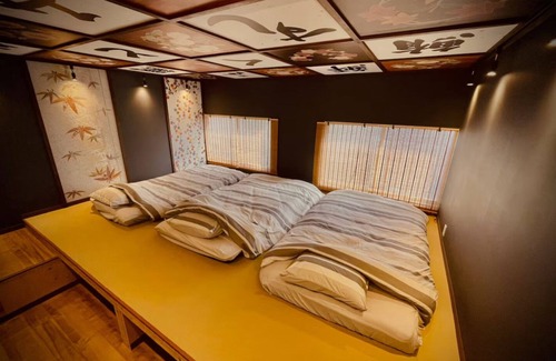 Shimogyo Apartment | Local sushi place turned homestay. Only 6 - minute walk from Juso Station.