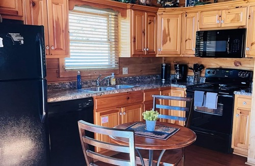 Black Bear Falls Cabin | Located in Black Bear Falls Resort cozy cabin for two with new hot tub