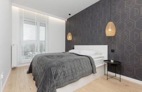 Bielany Apartment | Loft Apartment with Parking in Warsaw by Noclegi Renters