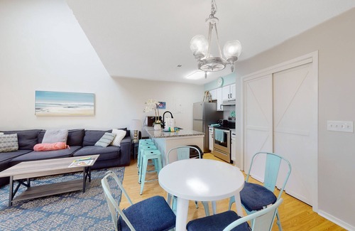 Little River Condo | Loft condo near beach & golf with covered porch, tennis, balcony, & grill