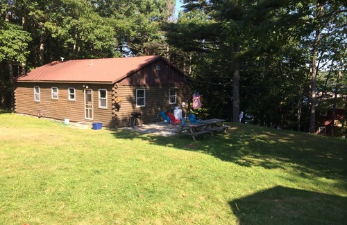 Liberty Cabin | Log cabin on Lake St George! Family adventures await. Openings in September!