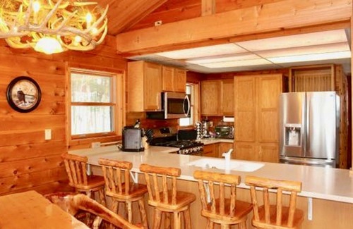 Au Train Cabin | Log Home Luxury awaits on the west shore of AuTrain Lake!