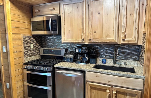 Au Train Cabin | Log Home Luxury awaits on the west shore of AuTrain Lake!