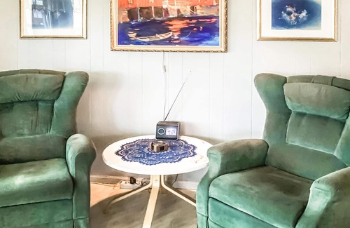 Repvag House | Look forward to a fantastic view of the fjord in this vacation home!