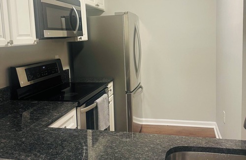 Odenton Condo | Lovely 2 bed/1bath corner unit with a private balcony.