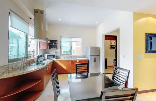 Zazil-ha Apartment | Lovely apartment with shared pool, free WiFi, central AC, & shared rooftop