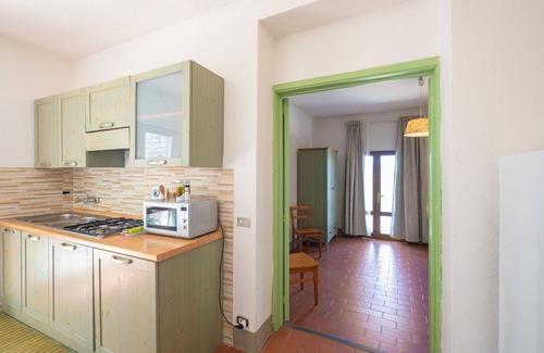 Montebonello Apartment | Lovely apartment for 4 people with pool, A/C, WIFI, TV, pets allowed, panoramic view and parking