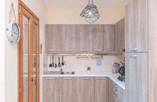 Porto Pozzo Apartment | Lovely apartment for 4 guests with A/C, pool, WIFI, terrace and pets allowed
