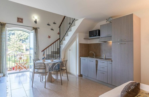 Latte Apartment | Lovely apartment for 4 guests with WIFI, pool, TV, balcony and parking