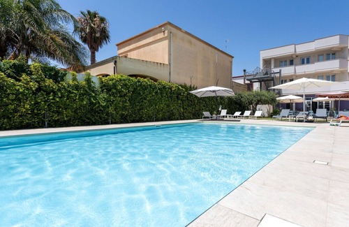 Marsala Apartment | Lovely apartment for 4 guests with WIFI, A/C, pool, TV and balcony