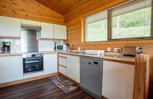 Drumnadrochit House | Lovely apartment in villa for 6 guests with WIFI, TV, patio and panoramic view