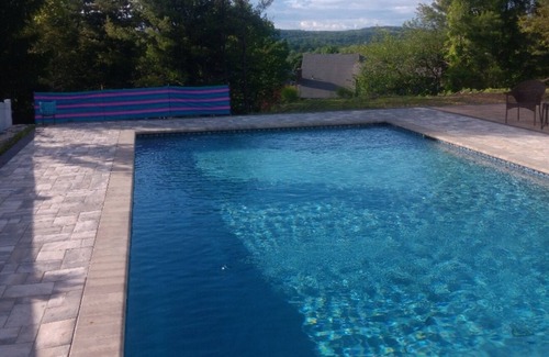 Warwick House | Lovely master bedroom;access to kitchen.dining,deck and backyard including pool.