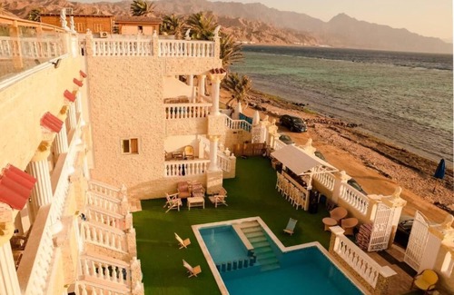 Dahab Apartment | Lucky Palace Dahab , Beach Front Chalets with a beautiful pool - Pet Friendly