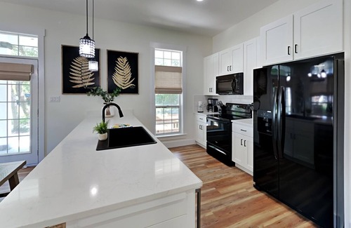 Sugarwood Beach House | Lush Pet-Friendly Home, Near Beach with Golf Cart, 4 Bikes