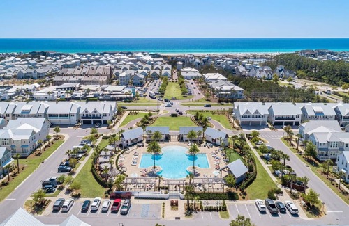Panama City Beach House | LUX Townhome! Pet Friendly, Heated Pool/Golf Cart