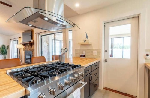 Ono Island Villa | Lux Waterfront Oasis w/Private Dock, Kayaks, Blackstone Grill, and Fire Pit