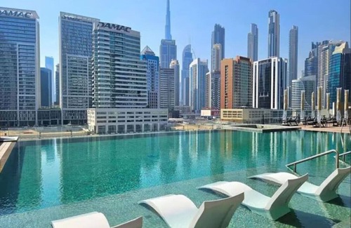 Business Bay Apartment | Luxe 2 Bedroom with Burj Khalifa and Canal Views