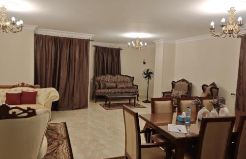 New Cairo Apartment | Luxurious 3 room hotel apartment just steps away from North 90th Street offering a perfect blend of comfort and convenience Ideal for families