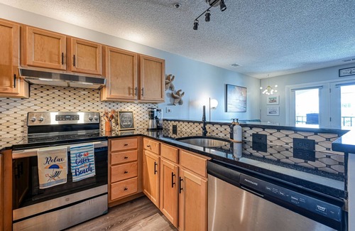 North Topsail Beach Condo | Luxurious Condo, Massage Chair, Arcade Games, Beautiful Pools, Hot Tubs, King bd