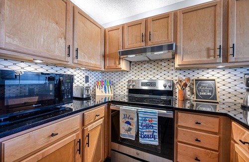 North Topsail Beach Condo | Luxurious Condo, Massage Chair, Arcade Games, Beautiful Pools, Hot Tubs, King bd
